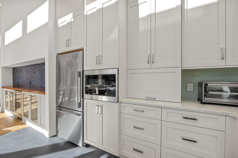 Natural light highlighting custom millwork and white oak cabinetry.